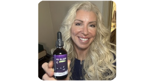 Lisa relaxing in bed after using Yu Sleep® natural sleep support drops for faster sleep, calm relaxation, and better sleep quality